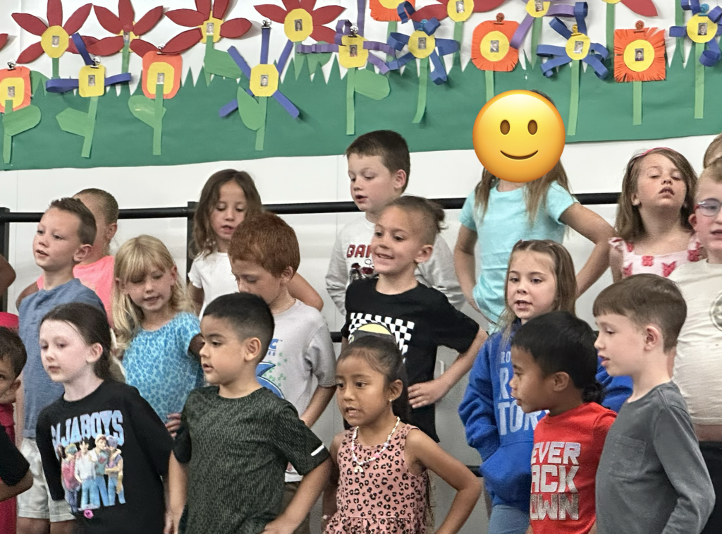 students preforming in their school program