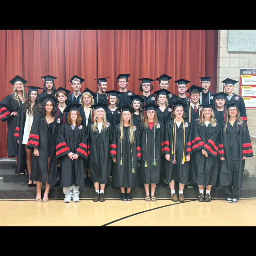 picture of seniors in the caps and gowns