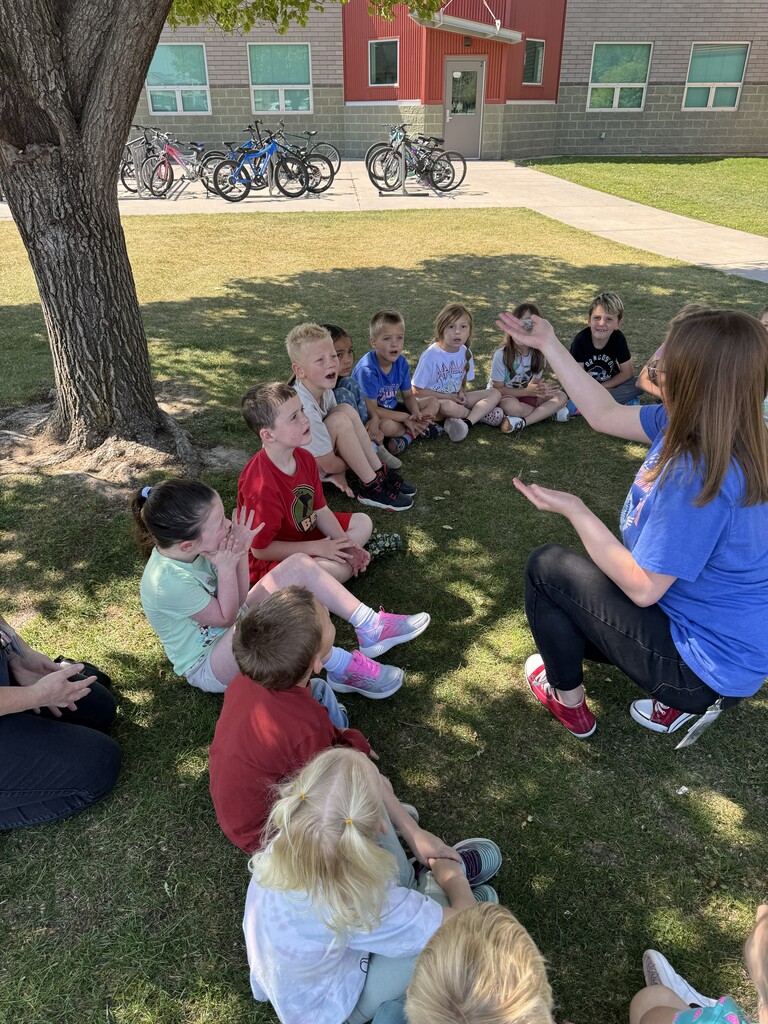 Kinder and 1st growing releasing the Butterflies.