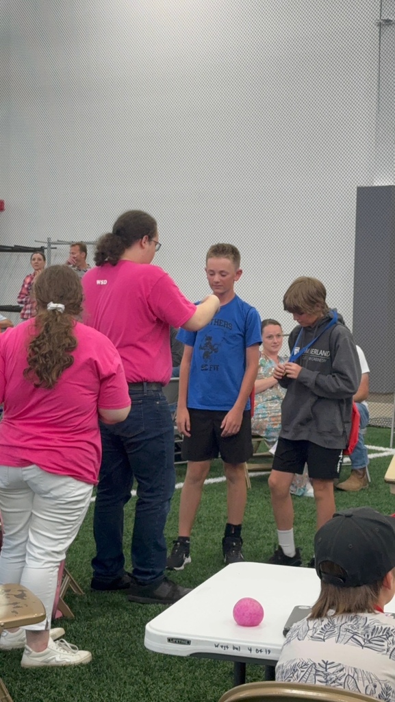 two students getting awards 