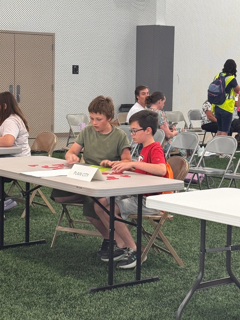 students sitting at a table