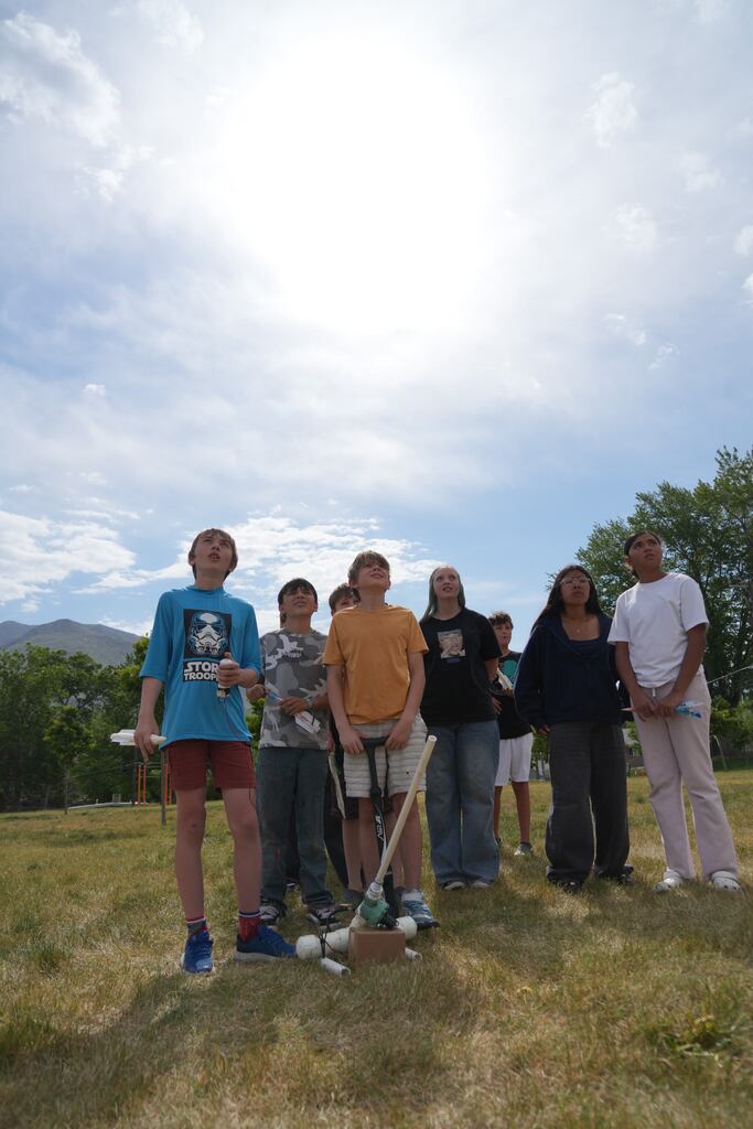 Sixth-graders launching the rockets they build through a hands on learning experience. 