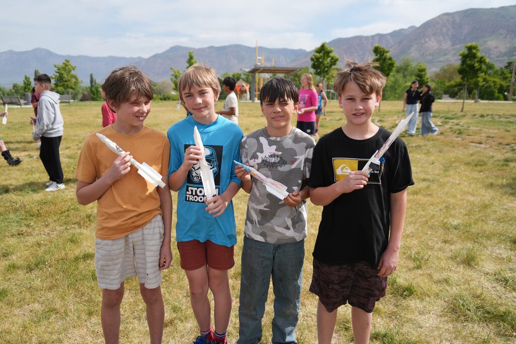Sixth-graders launching the rockets they build through a hands on learning experience. 