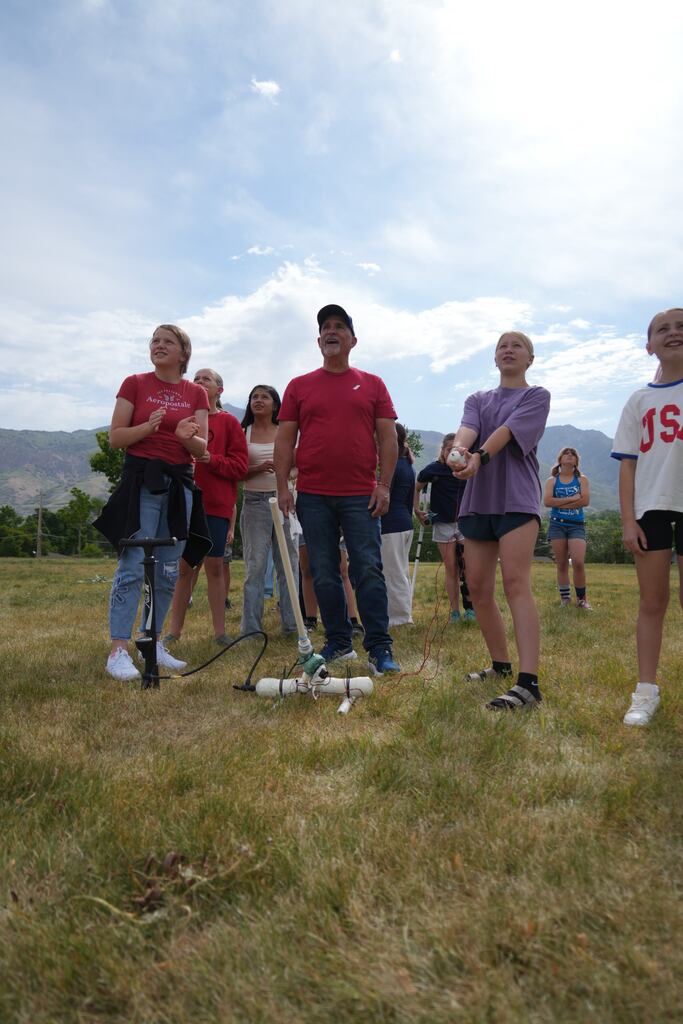 Sixth-graders launching the rockets they build through a hands on learning experience. 