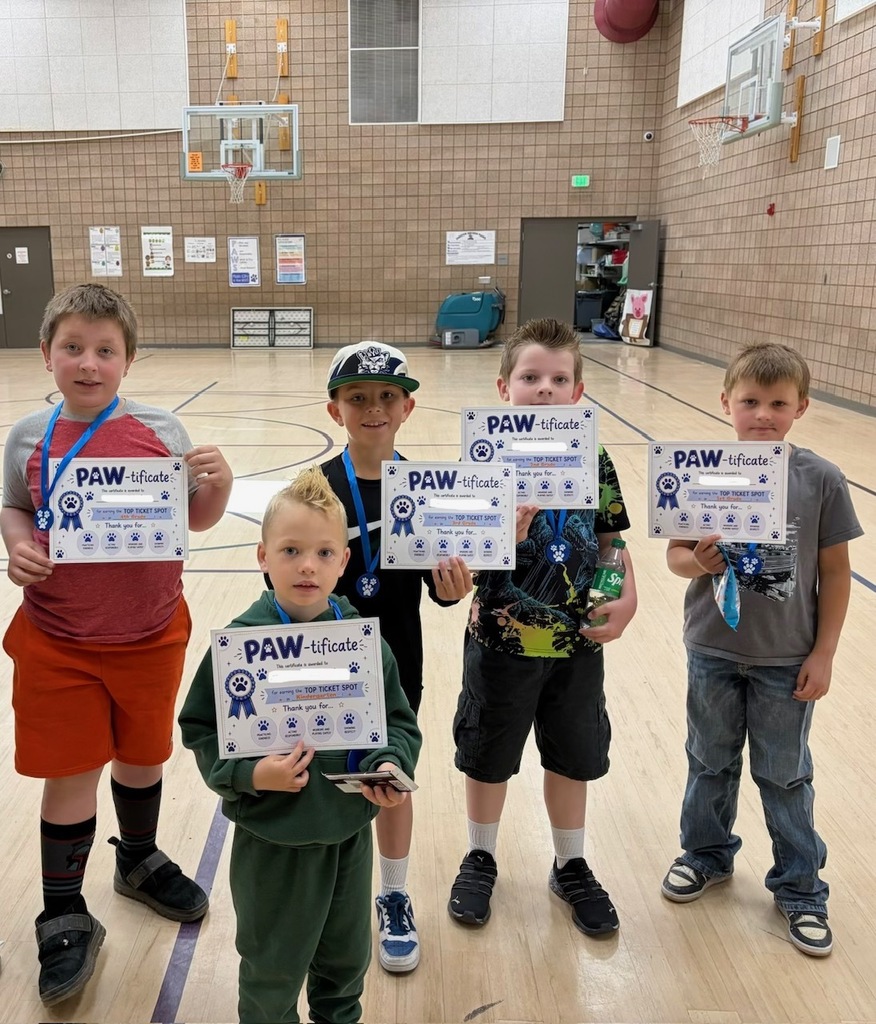 students smiling with rewards/ paw-tificates