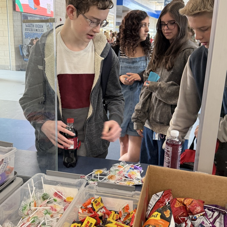 students shopping at the school store