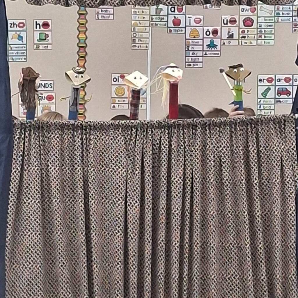 puppets in a puppet show.