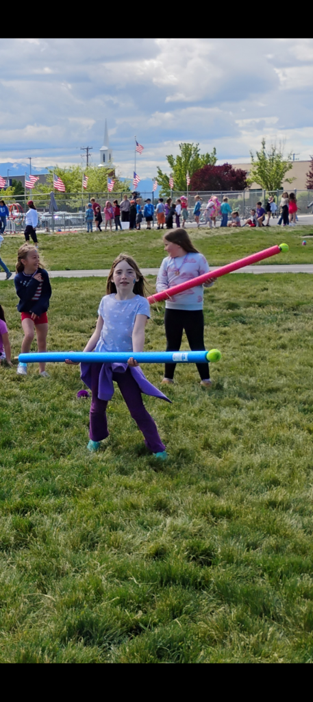 children playing at field day