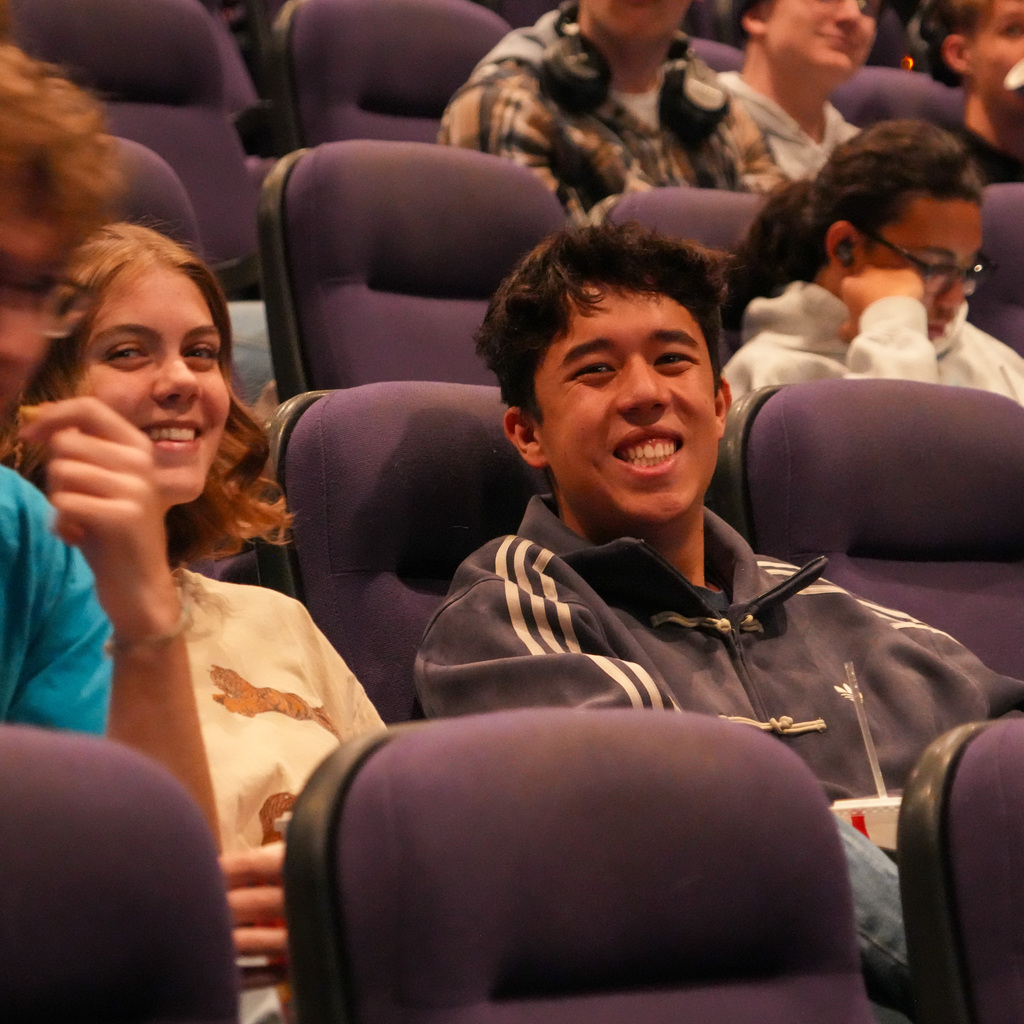 Two students sitting in the theater