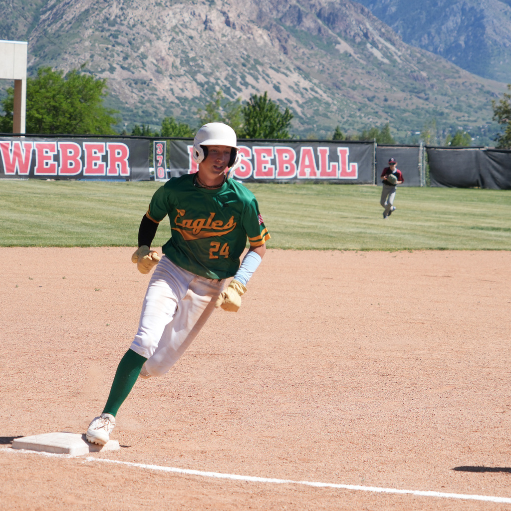 A Wahlquist player runner rounds the third base