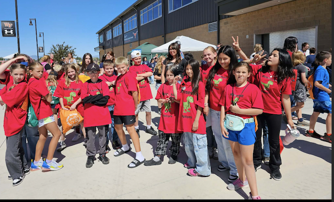 students at the STEM olympiad together as a group being silly