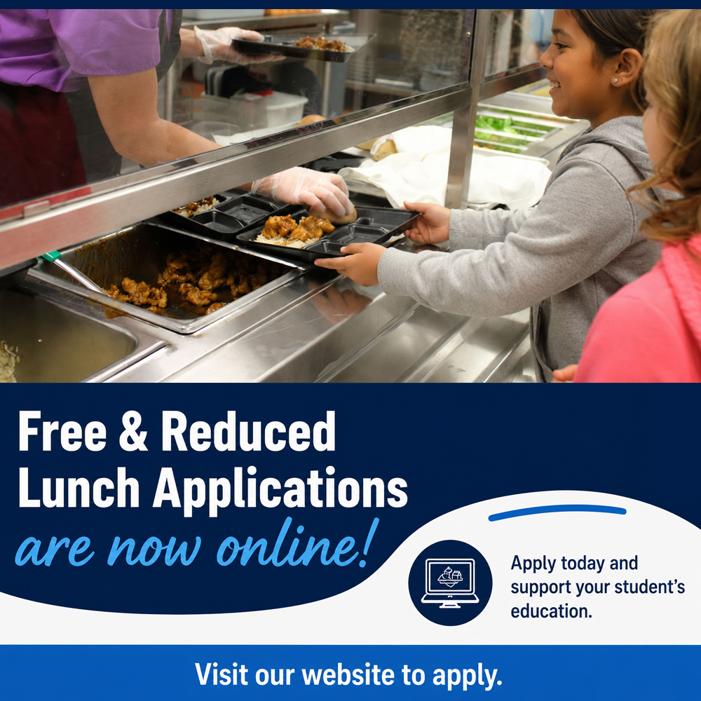 A student is smiling while taking a tray of food being served by a school nutrition worker.