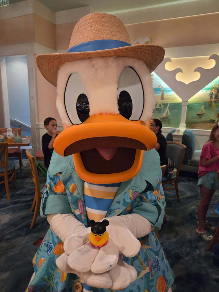 Donald holding a Duck