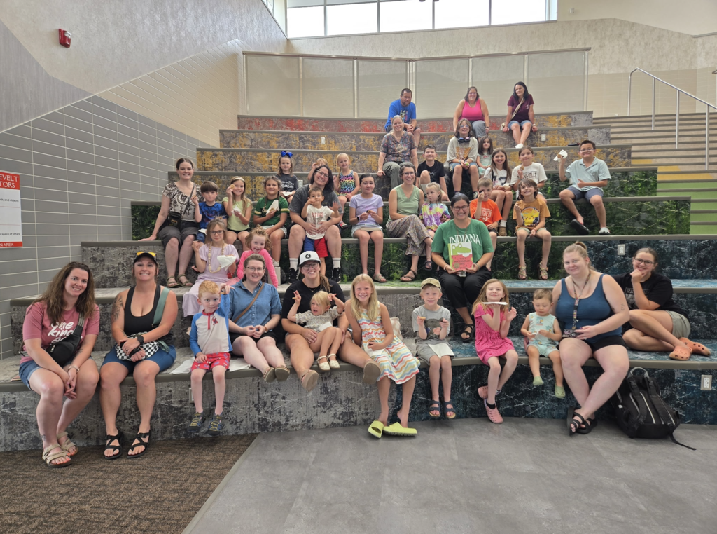 a large group of people who came to cookies and summer reading