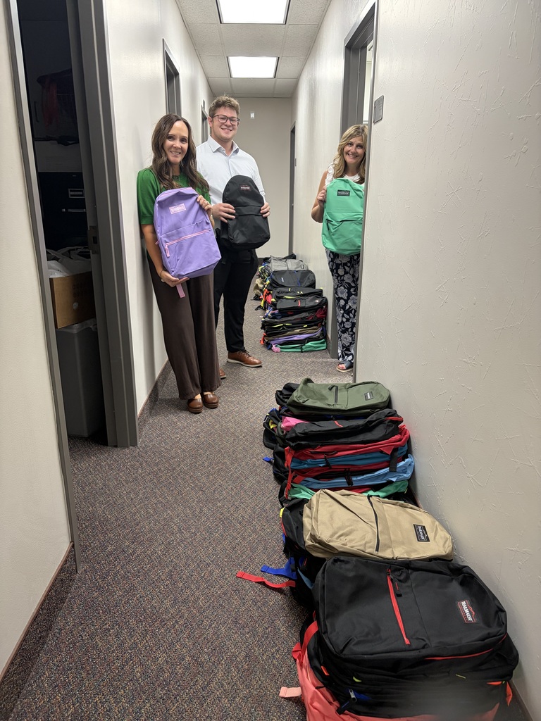Audio Enhancement donates backpacks
