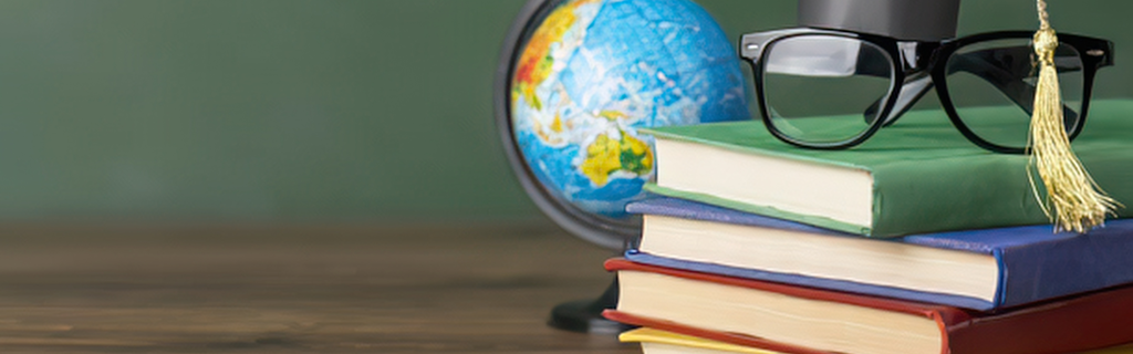 books, glasses and globe