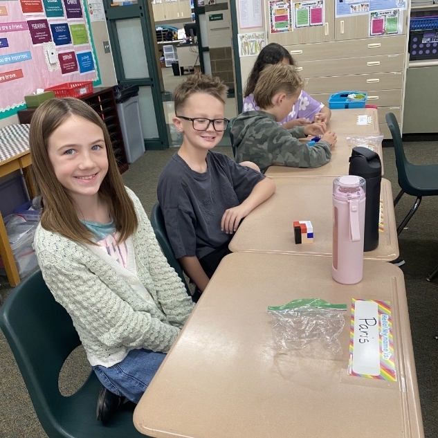 kids from Mrs. Anderson's class working with legos
