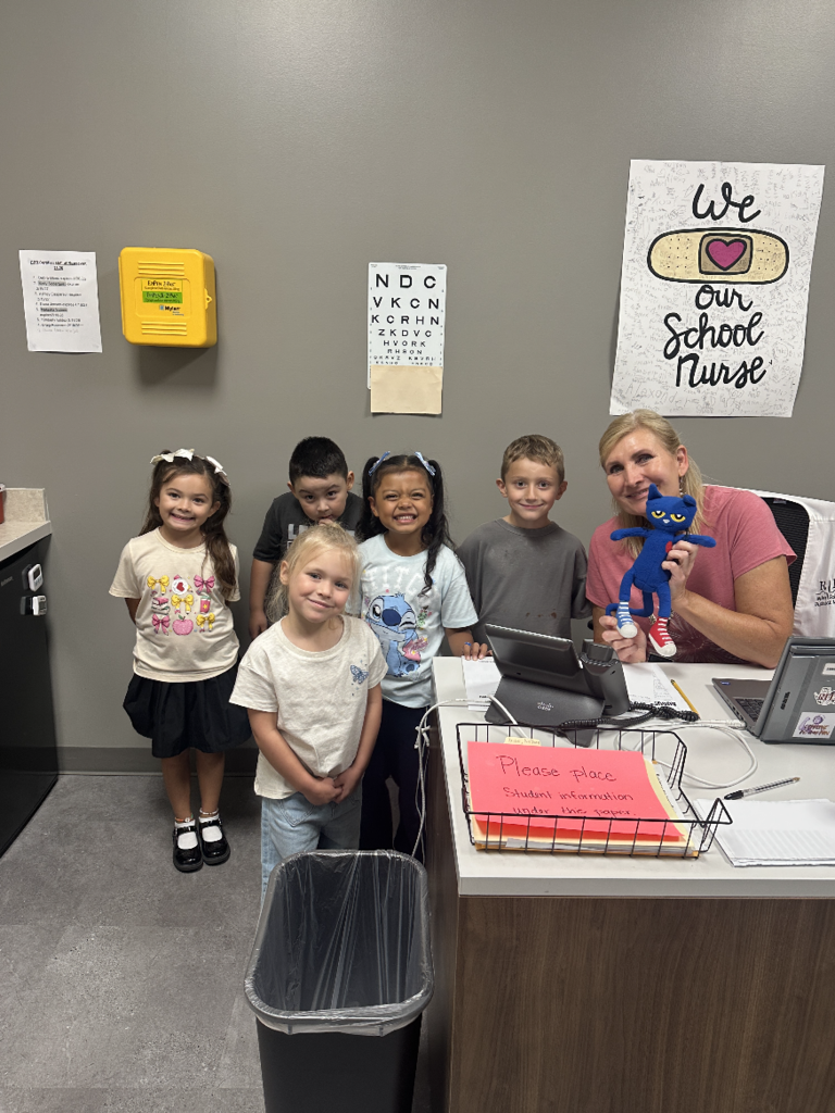 group of students with the school nurse