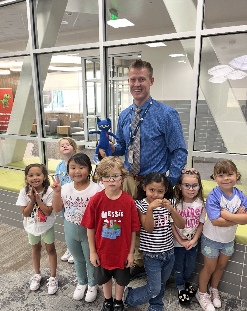 group of students with the assistant principal
