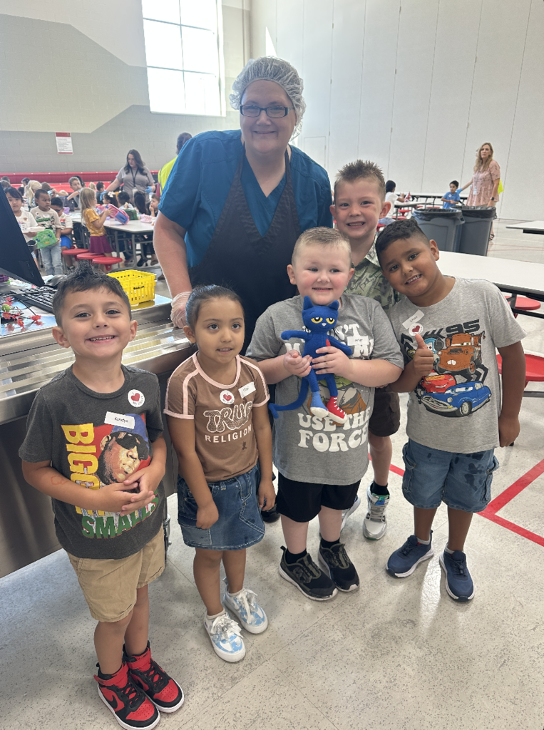 group of students with the nutrition service worker