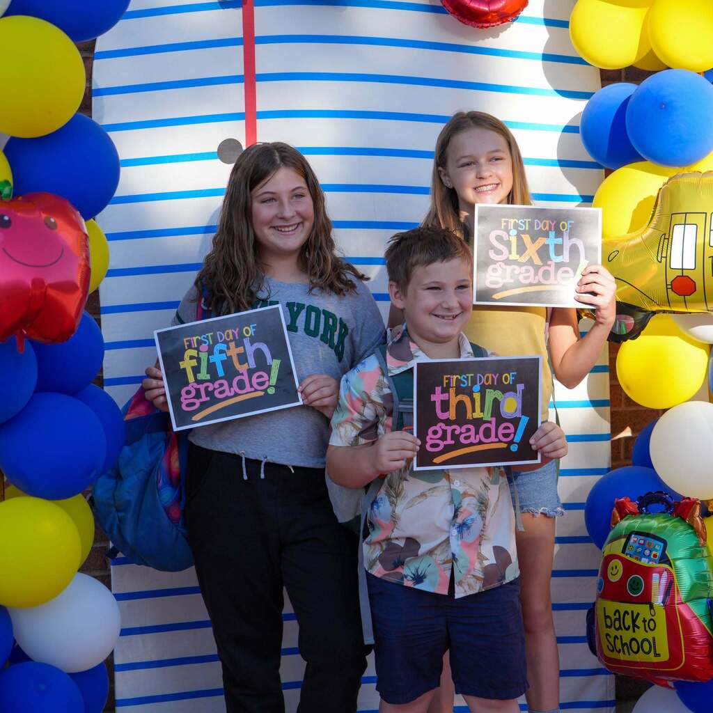 Students posing for pictures on the first day.