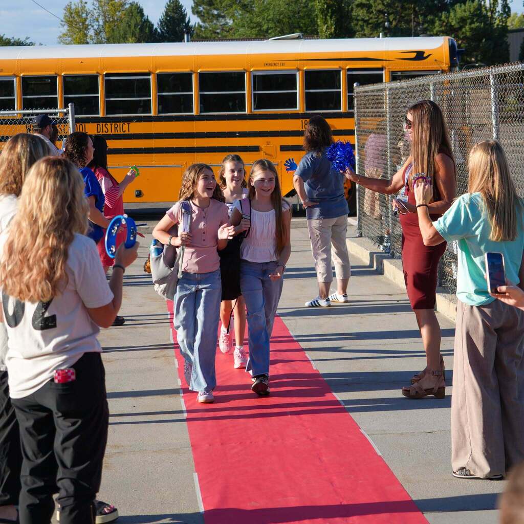 Students walking in to school on the first day.