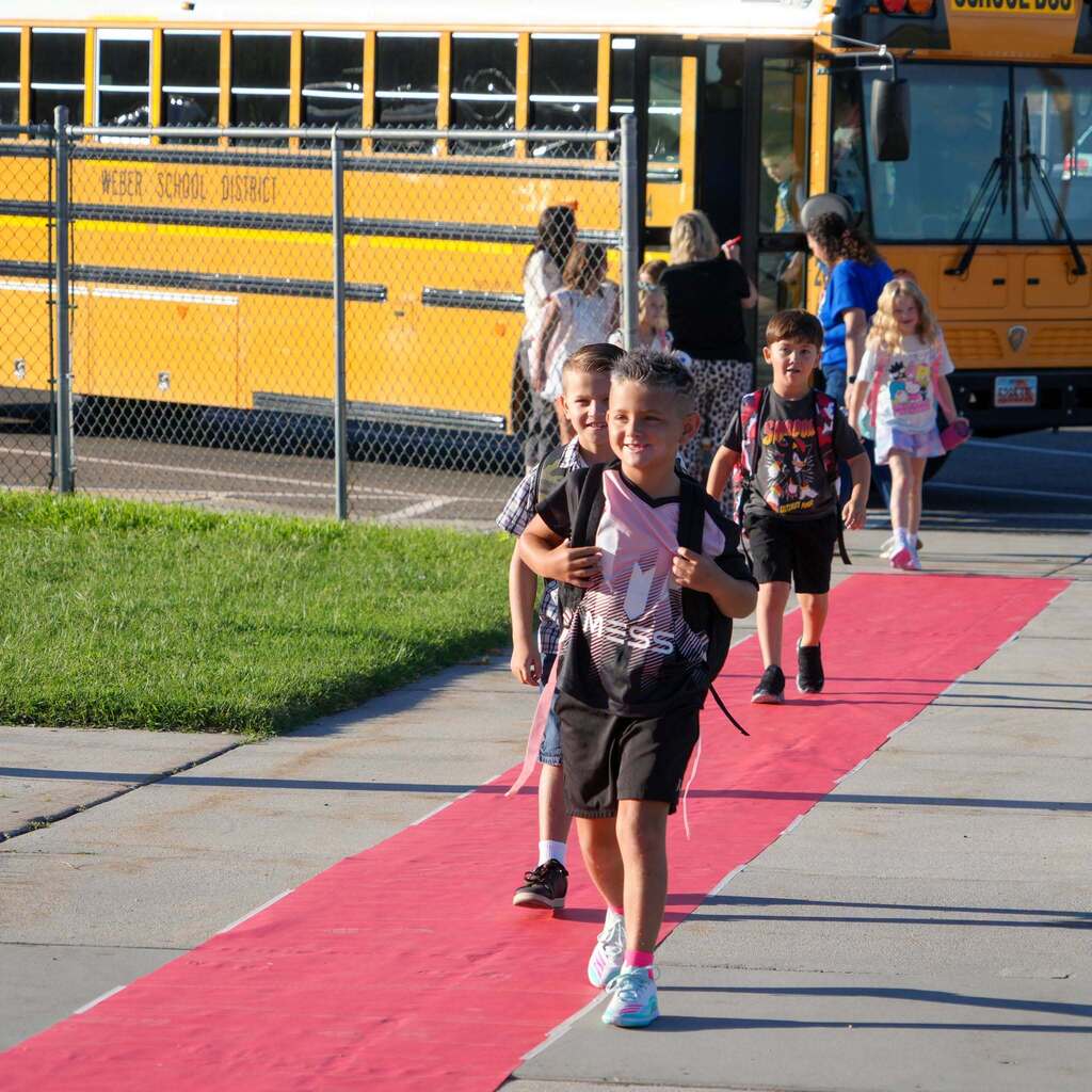 Students walking in to school on the first day.