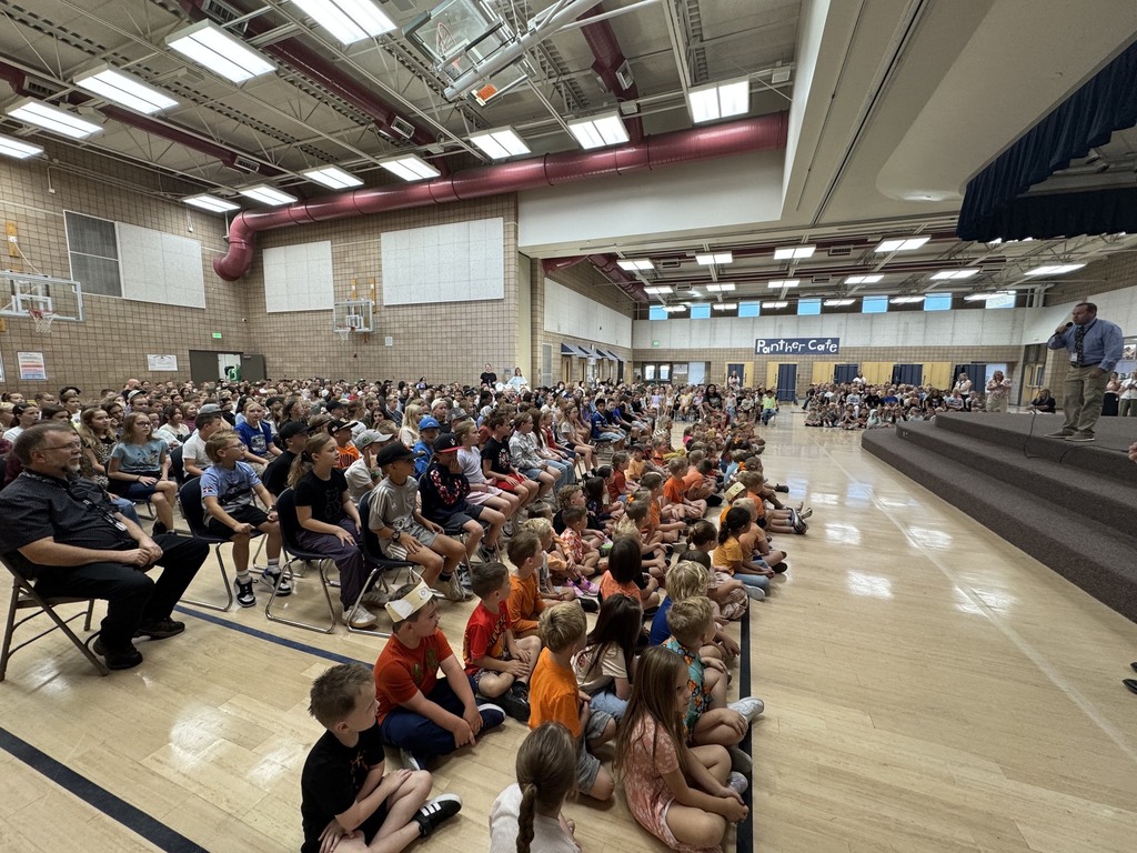 plain city elementary students wait patiently to see and hear from the ogden raptors players in an assembly in the gymnasium 