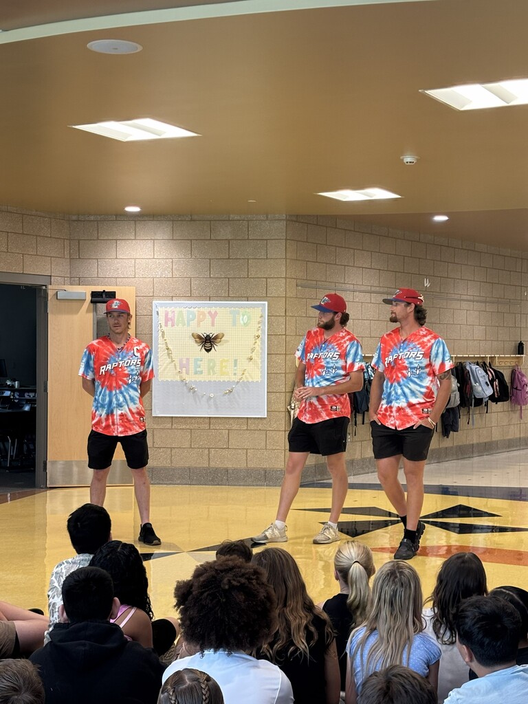 Ogden Raptor players visiting with students at Burch Creek Elementary. 