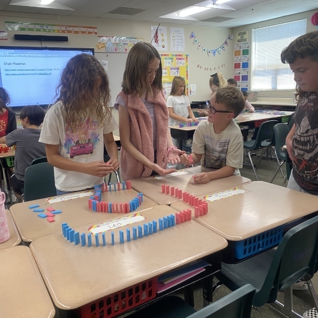 kids ding a science experiment with blocks