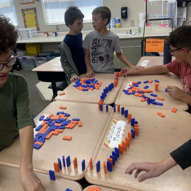 kids ding a science experiment with blocks