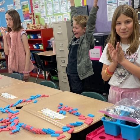 kids ding a science experiment with blocks