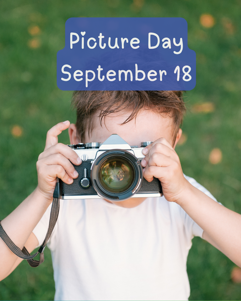 child holding camera with caption "picture day september 18"