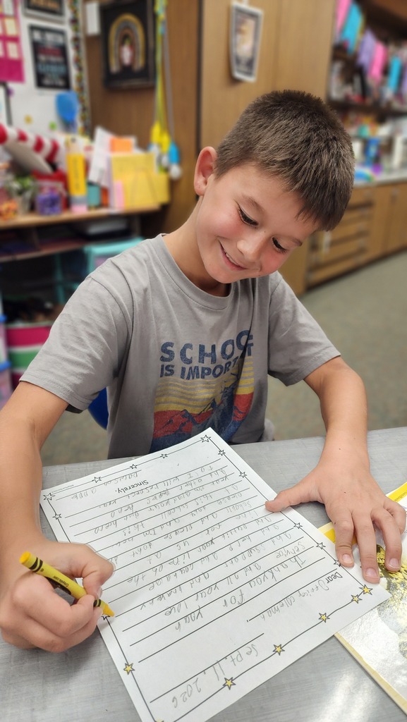 Student writing a note