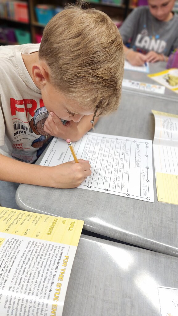 student writing note