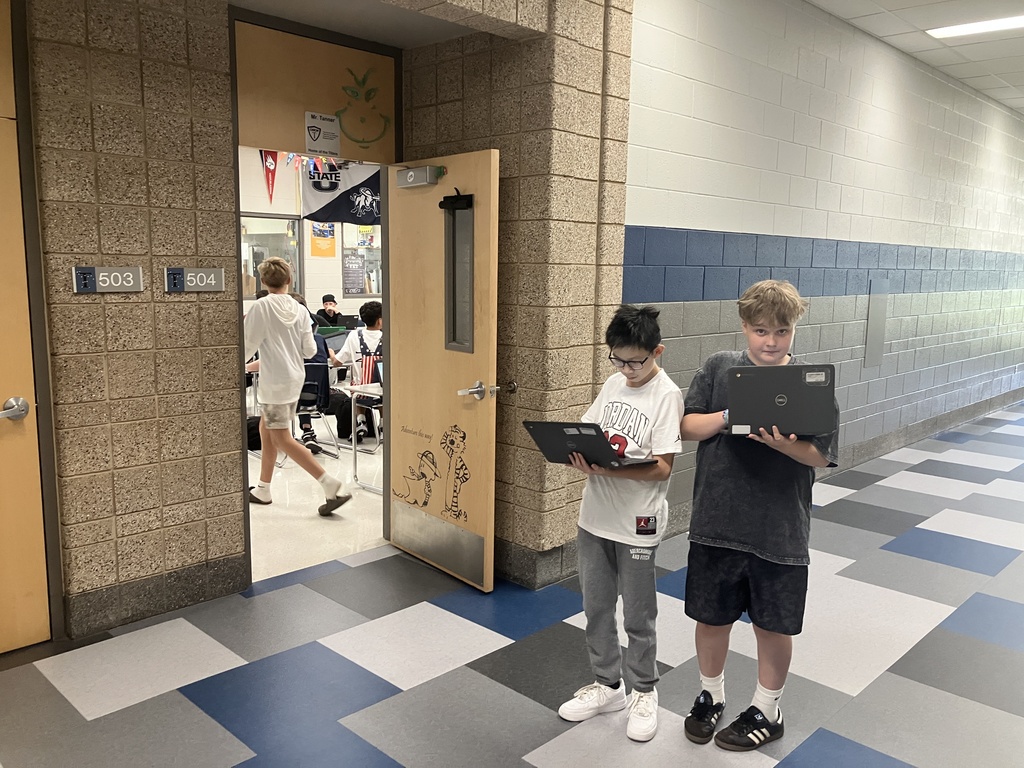 The App creators class is trying their hand at creating their very first algorithm. Trying to get another student to end up at the location of their choosing using clear and precise commands.
