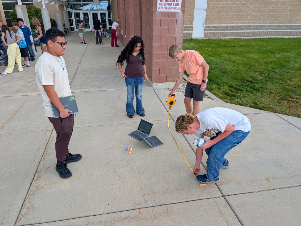 Drawing stars to scale. Outside with chalk for one day and then indoors for day 2. They also studied the colors of a flame and how it relates to stars.