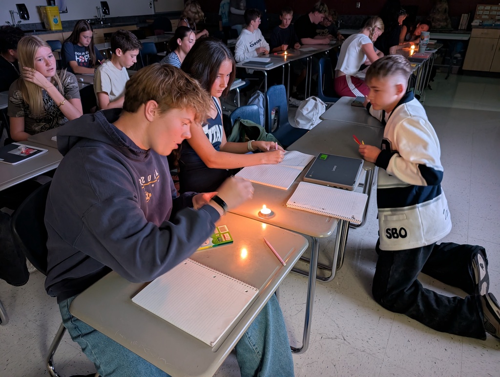 Drawing stars to scale. Outside with chalk for one day and then indoors for day 2. They also studied the colors of a flame and how it relates to stars.