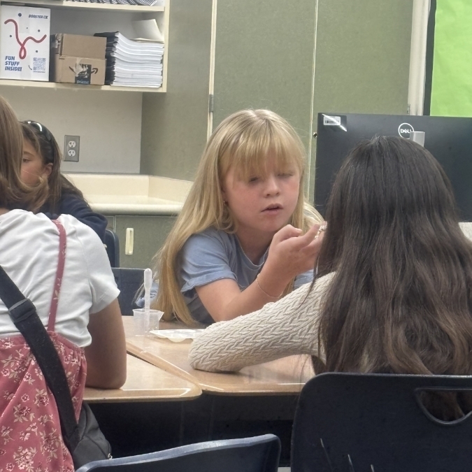 students working together on science investigation
