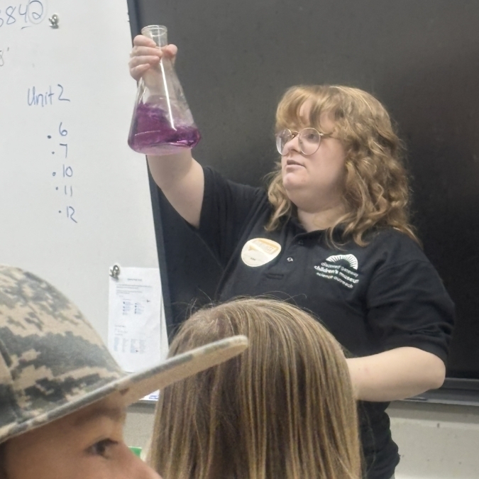 students observing chemical reactions in science