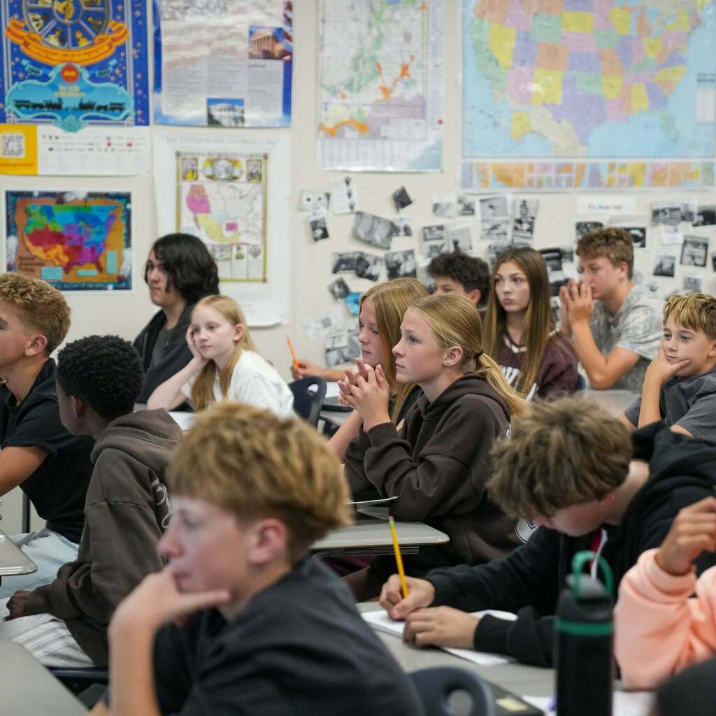 Junior high students sit attentively at their desks during a classroom lesson at South Ogden Junior High.