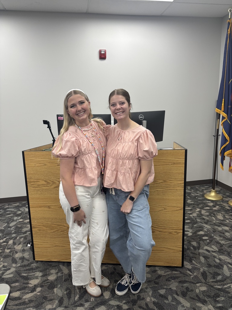Mrs. Mora and Mrs. Fowers wearing same shirts at new teacher training.