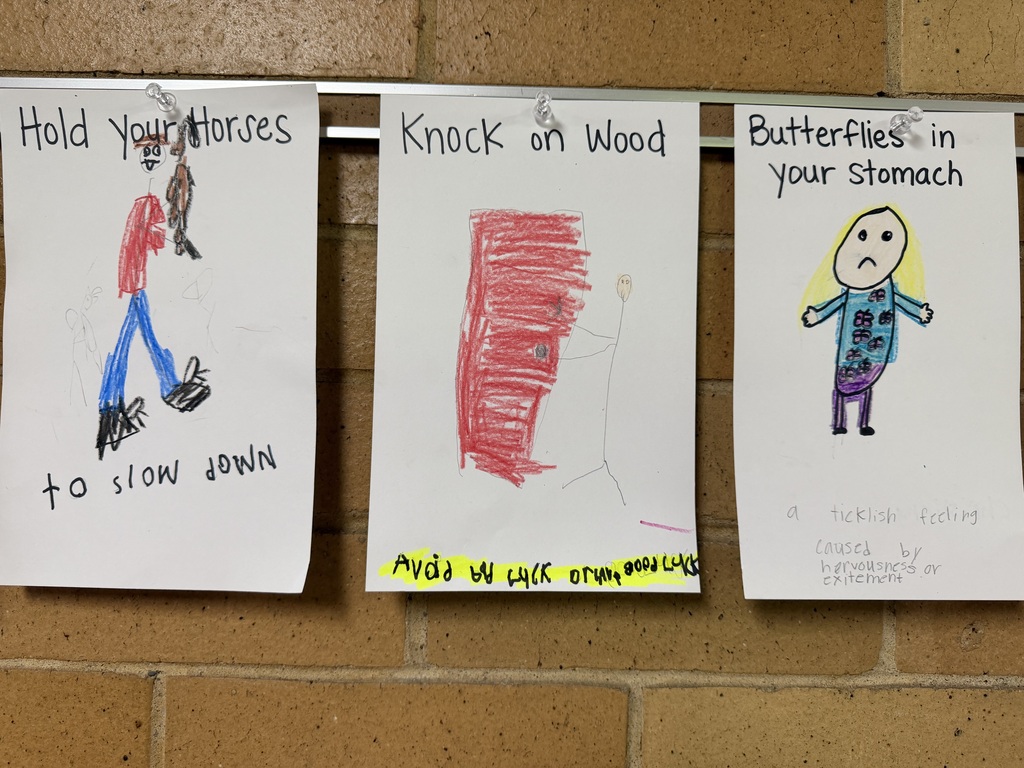 Student drawings illustrating the idioms "Hold Your Horses," "Knock on Wood," and "Butterflies in your stomach."