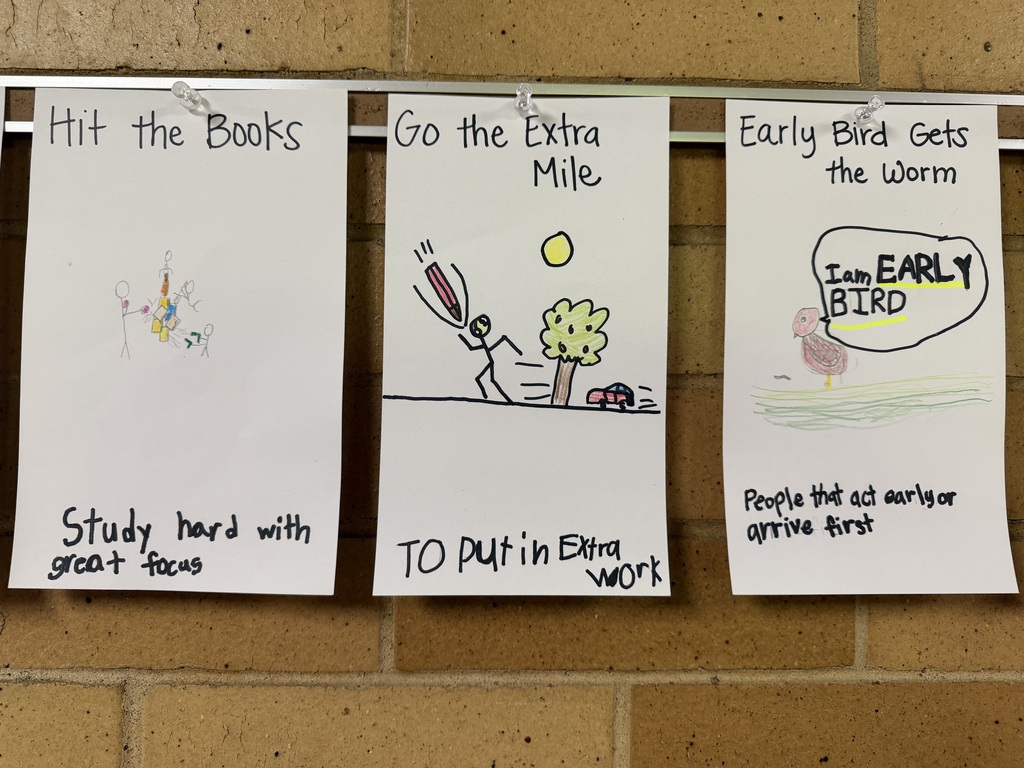 Student drawings illustrating the idioms "Hit the Books," "Go the Extra Mile," and "Early Bird Gets the Worm."