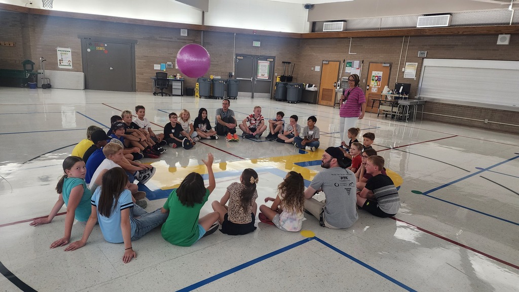 running club participants sitting in a circle