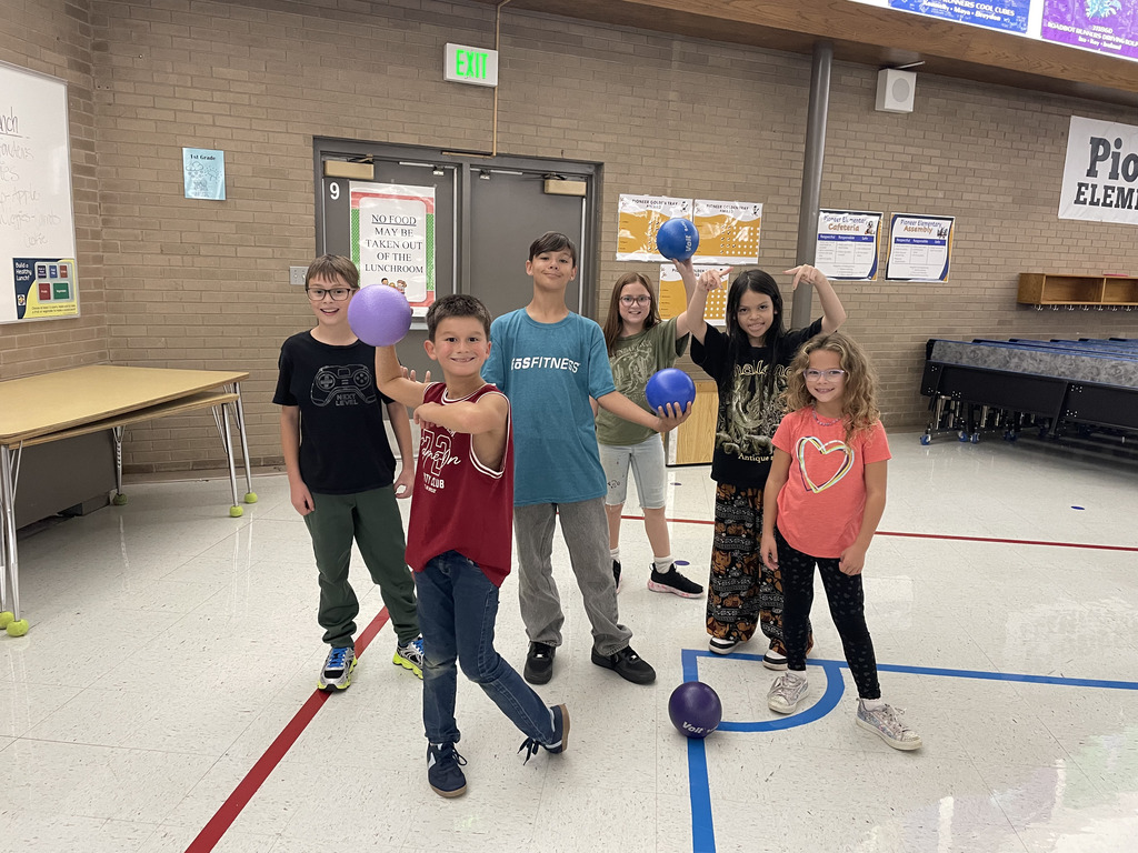running club members  getting ready to play dodge ball