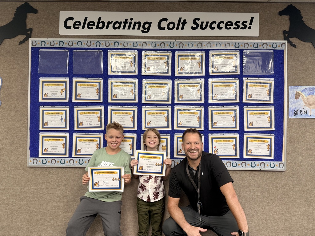 Colt Success picture of students and principal