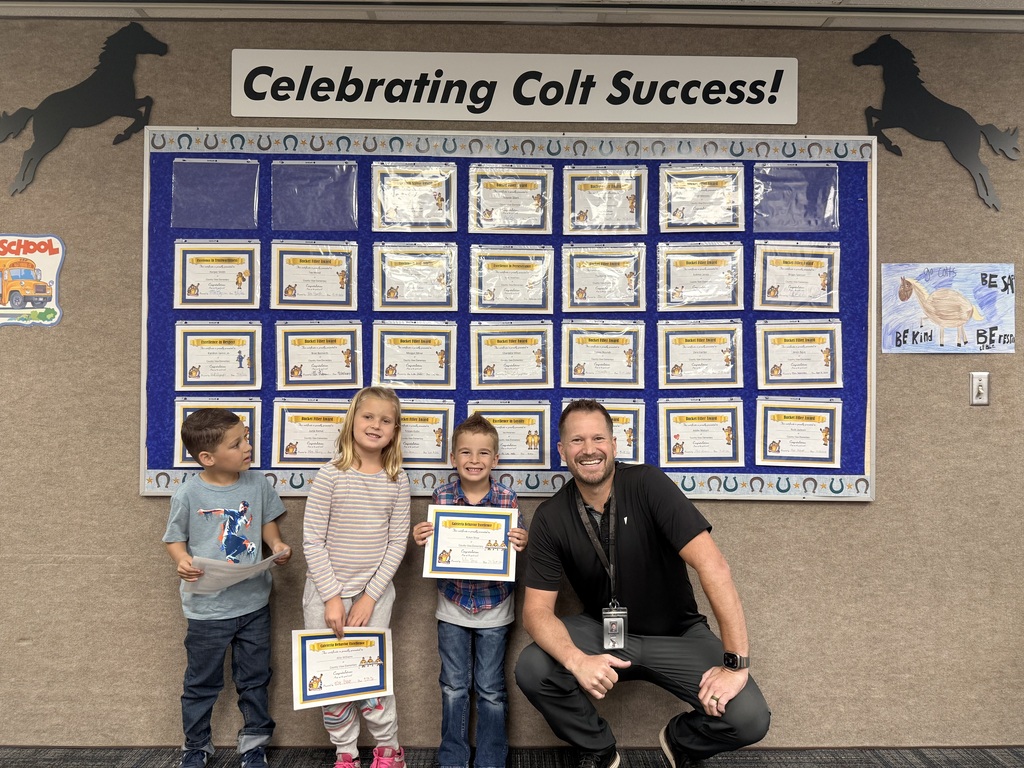 Colt Success picture of students and principal