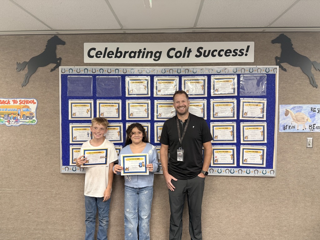 Colt Success picture of students and principal