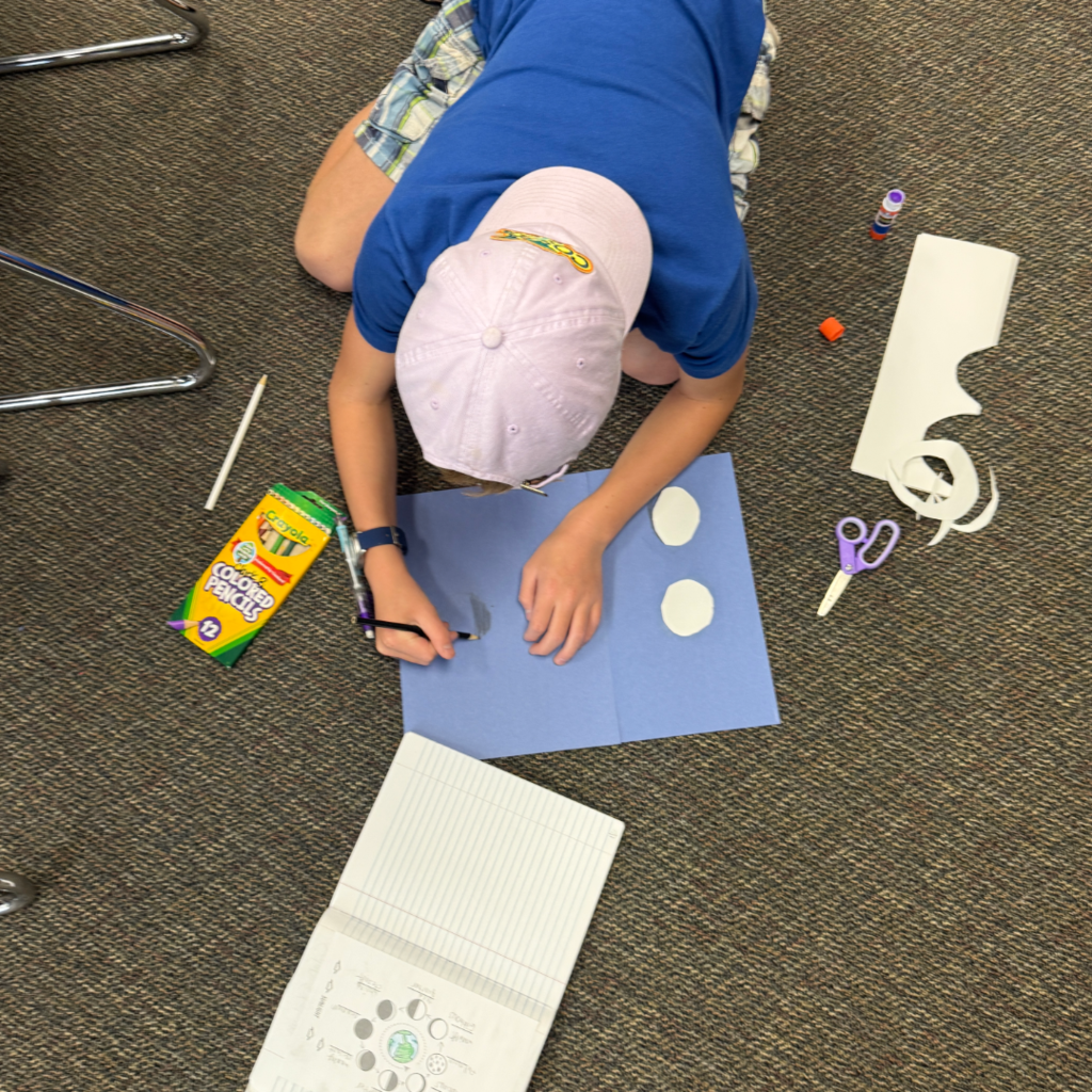 Students with their moon phase models.